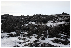 Snow-covered volcanic terrain.