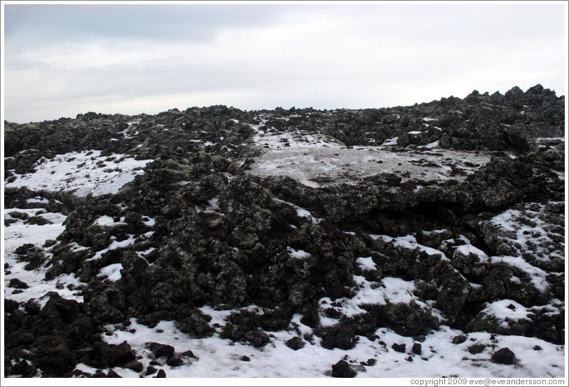 Snow-covered volcanic terrain.