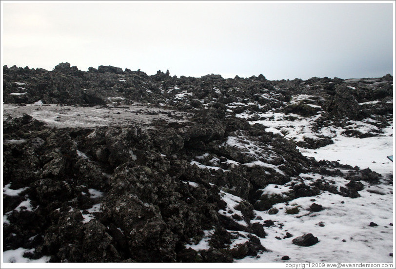 Snow-covered volcanic terrain.