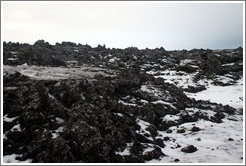 Snow-covered volcanic terrain.