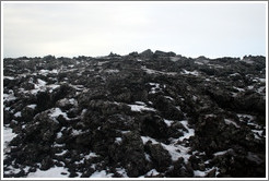 Snow-covered volcanic terrain.

