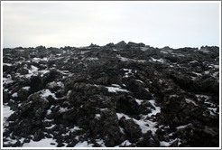 Snow-covered volcanic terrain.

