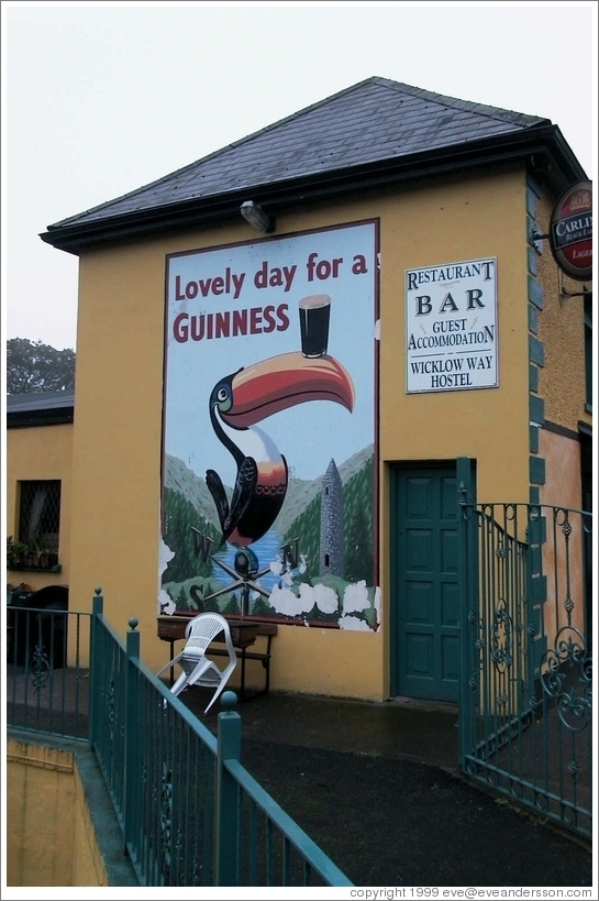 "Lovely day for a Guinness" -- on the side of a pub in a tiny town south of Dublin