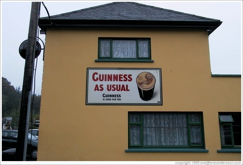 "Guinness As Usual" -- on a pub in a tiny town south of Dublin.