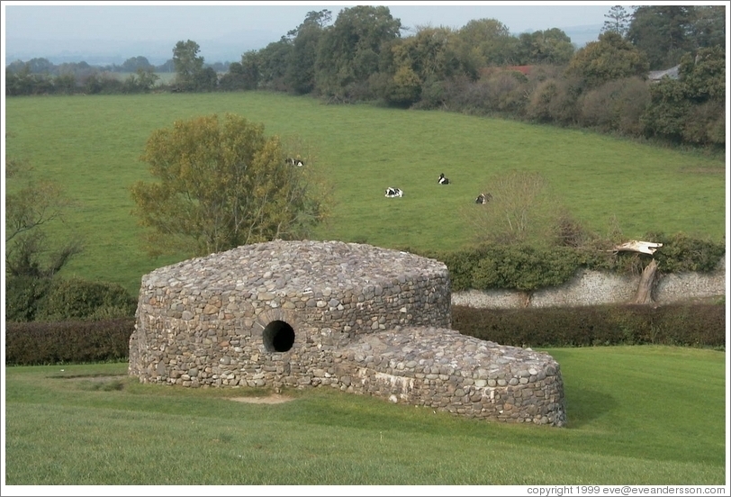 Some side house (not labeled), with cows relaxing in the background.