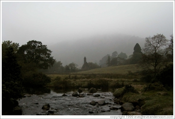 House beyond river.