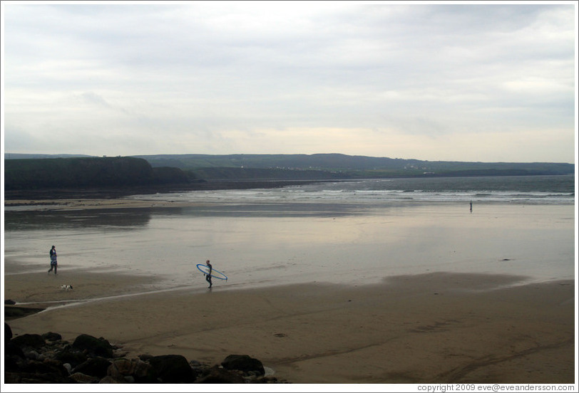 Lahinch Beach, with one surfer.