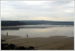 Lahinch Beach, with one surfer.