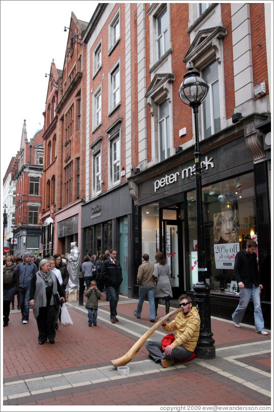 Didgeridoo player.  Grafton Street.	