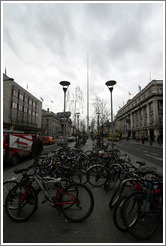 The Spire, behind bicycles and statue of James Larkin.  O'Connell St.