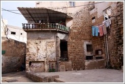 Courtyard with towels on a clothesline, old town Akko.