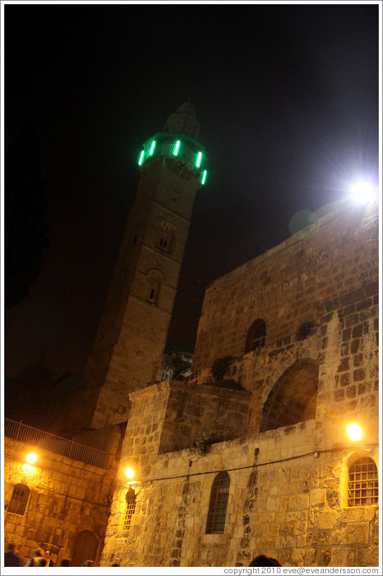 Church of the Holy Sepulchre and mosque with green neon lights, Christian Quarter, Old City of Jerusalem.
