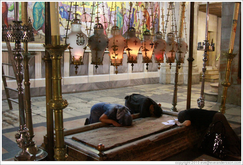 Stone of Unction, believed to be the place where Jesus' body was washed after his death.  Church of the Holy Sepulchre, Christian Quarter, Old City of Jerusalem.