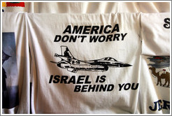 Shirt for sale in the souk; it reads, "America don't worry / Israel is behind you."