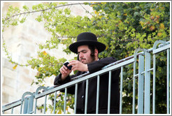 Orthodox Jewish man, on landing above Western (Wailing) Wall, Old City of Jerusalem.