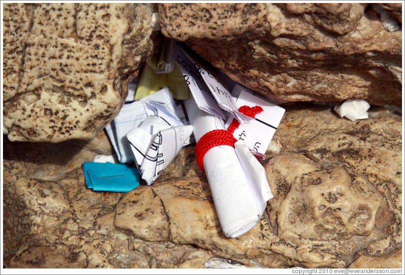 Papers stuffed into a crack in the Western (Wailing) Wall, Old City of Jerusalem.