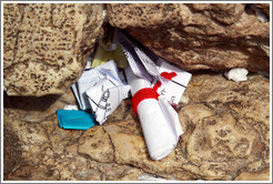 Papers stuffed into a crack in the Western (Wailing) Wall, Old City of Jerusalem.