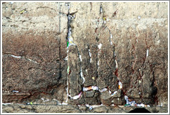 Papers stuffed into cracks in the Western (Wailing) Wall, Old City of Jerusalem.