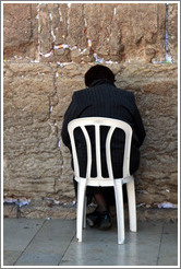 Woman praying at the Western (Wailing) Wall, Old City of Jerusalem.