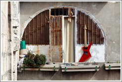 Balcony with an electric guitar, seen from the roof of the Tomb of David, Mt. Zion.