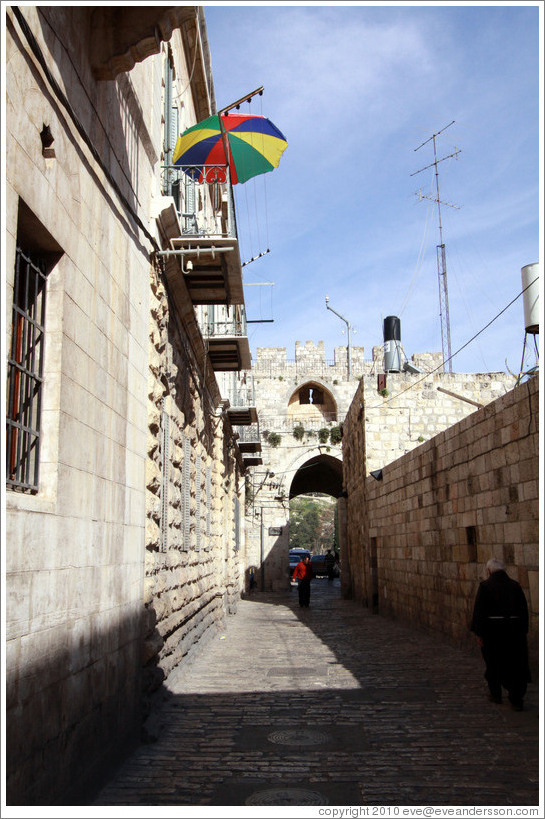 The Lions' Gate and a colorful umbrella, Muslim Quarter, Old City of Jerusalem.