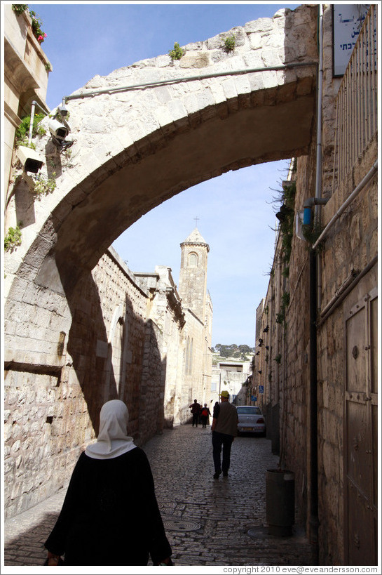 Woman and arch, Via Dolorosa, Muslim Quarter, Old City of Jerusalem.