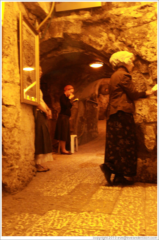 Women praying at the closest point to the Holy of Holies, Western Wall Tunnel.