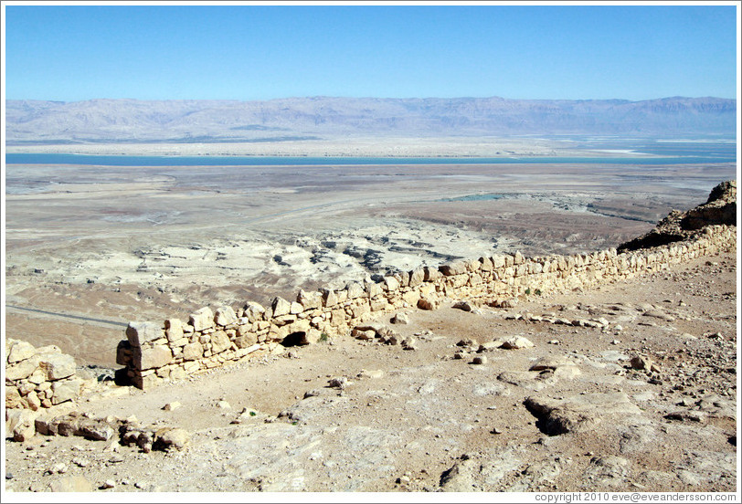 Eastern wall, desert fortress of Masada, with a view of the Dead Sea in the background.