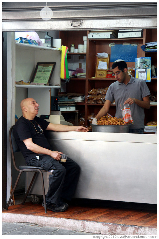 Men in a storefront, Shabazi Street, Neve Tzedek.