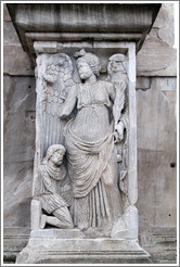 Slave kneeling before an angel.  Arco di Costantino (Arch of Constantine).