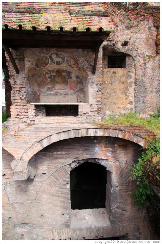 Insula dell'Ara Coeli, constructed early 2nd century.  The fresco depicts Christ descended from the cross between the virgin Mary and St. John the Apostle.