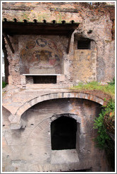 Insula dell'Ara Coeli, constructed early 2nd century.  The fresco depicts Christ descended from the cross between the virgin Mary and St. John the Apostle.