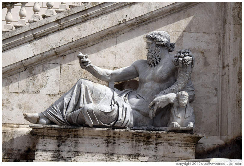 Sculpture of a man leaning on a sphinx.  Piazza del Campidoglio.