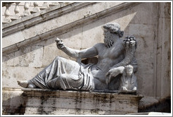 Sculpture of a man leaning on a sphinx.  Piazza del Campidoglio.