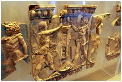 Bell plate with the contest between Apollo and Heracles for the Delphic tripod, 36-28 BC.  Museo Palatino (Palatine Museum).