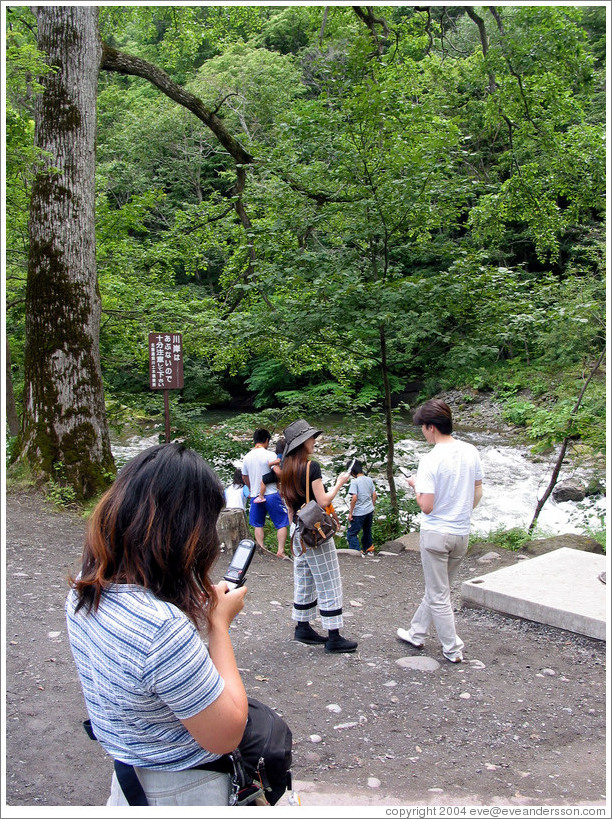 Cellphone photographers.  Daisetsuzan National Park.  Hokkaido.