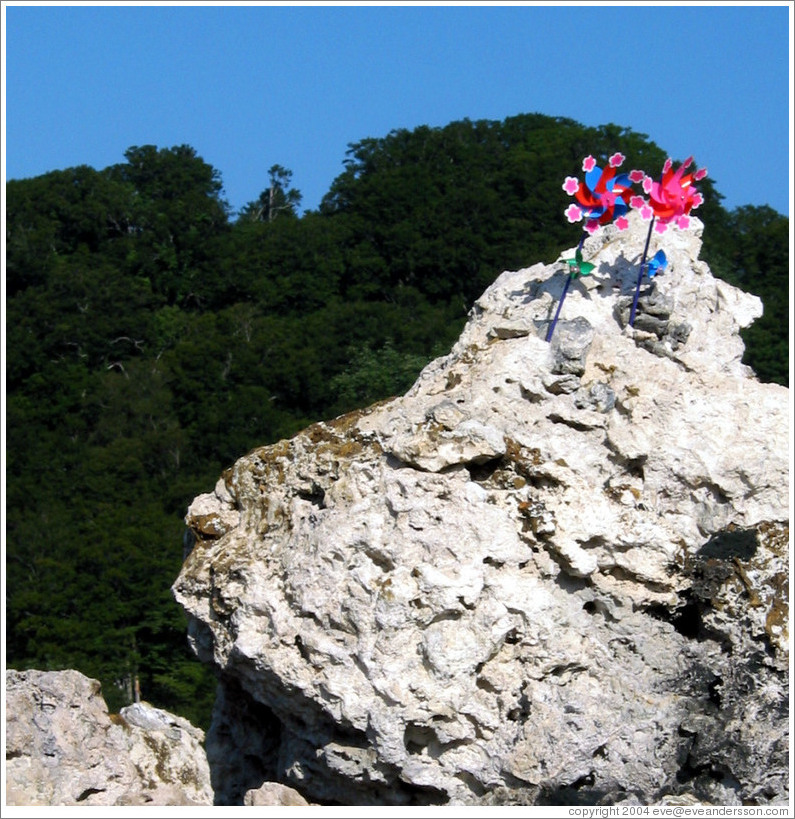 Volcanic rock with pinwheels for deceased children.  Mt. Osorezan.
