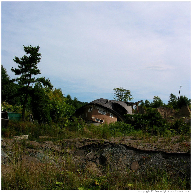 Destroyed house.  Nishiyama Crater Promenade.