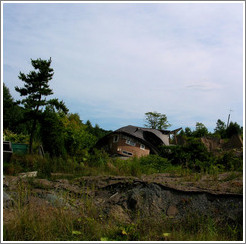 Destroyed house.  Nishiyama Crater Promenade.