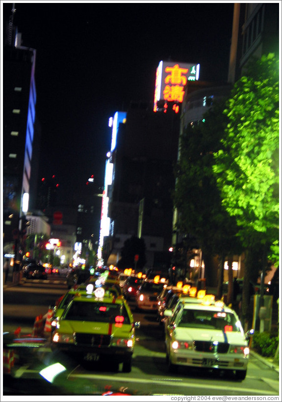 Taxis at night.  Shimbashi neighborhood.