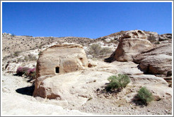 Rocks with holes carved into them.