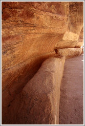 Aqueduct carved into the red stone.