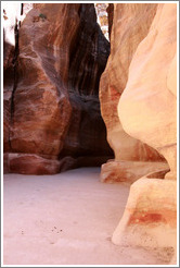 Pink and red rocks of As-Siq, a narrow natural gorge.