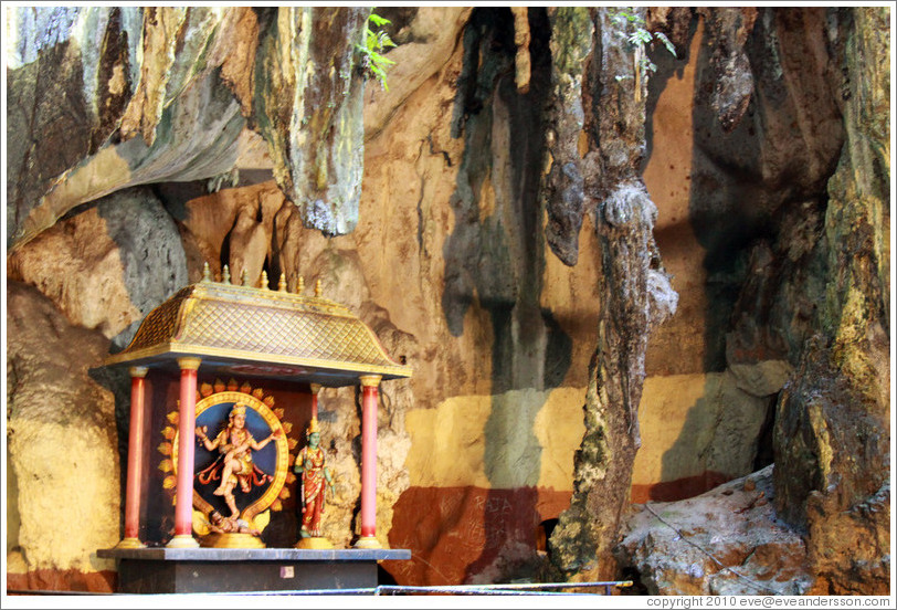 The goddess Lakshmi under stalactites, Batu Caves.