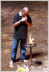 Man praying, Batu Caves.