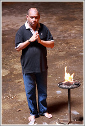 Man praying, Batu Caves.