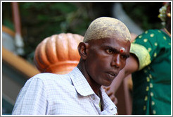 Man with painted head, Batu Caves.