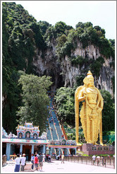 Stairway leading into Batu Caves, with Lord Murugan statue presiding.