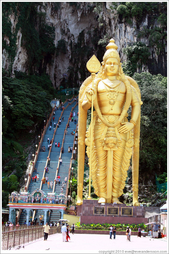 Stairway leading into Batu Caves, with Lord Murugan statue presiding.