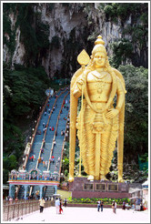 Stairway leading into Batu Caves, with Lord Murugan statue presiding.